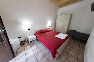 Säng eller sängar i ett rum på San Giuseppe