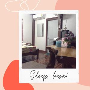 a picture of a room with a desk and a mirror at I love you 777 ไอเลิฟยู หัวสนามบิน Pet Friendly Airport Resort in Ubon Ratchathani