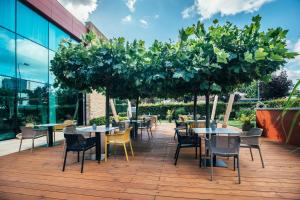 Reštaurácia alebo iné gastronomické zariadenie v ubytovaní Pierre Hotel