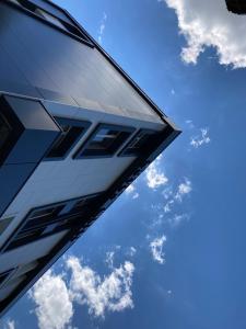 a close up of the corner of a building with the sky in the background at Hotel Shterev Karlovo in Karlovo