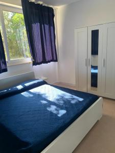 a bedroom with a large bed with a window at Portorosa in Torre Forte +36 photos