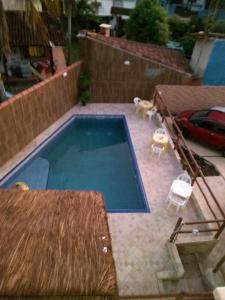Het zwembad bij of vlak bij Residencial Villa Nova