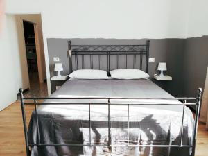 Posteľ alebo postele v izbe v ubytovaní B&B Casa Dalma