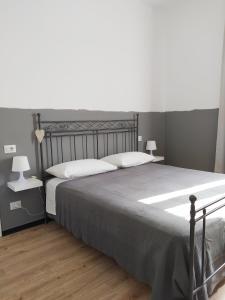 Posteľ alebo postele v izbe v ubytovaní B&B Casa Dalma