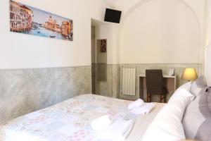 Guest House Relais Indipendenza客房内的一张或多张床位