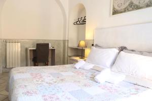 Guest House Relais Indipendenza客房内的一张或多张床位