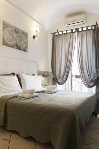 Guest House Relais Indipendenza客房内的一张或多张床位