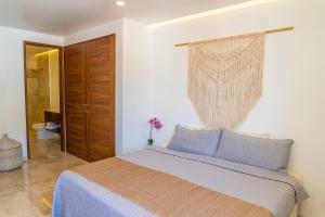 Postel nebo postele na pokoji v ubytování Tres Marias Luxury Suites - Adults Only