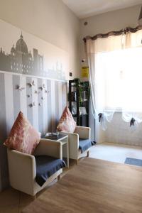 Guest House Relais Indipendenza的休息区