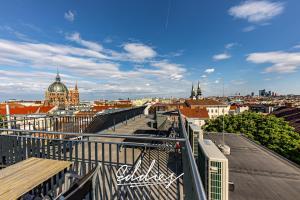 a view of a city from the roof of a building at Eddie’s Design Apartments in Vienna