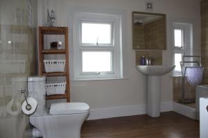 A bathroom at No3 By The Sea Apartment 