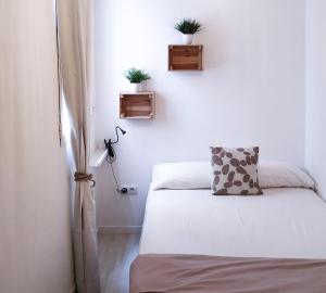 Een bed of bedden in een kamer bij Casa Acosta