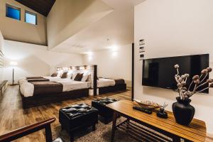 Katil atau katil-katil dalam bilik di Yamahana Onsen Tonden Japanese Inn