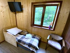 Postel nebo postele na pokoji v ubytování Під Магурою