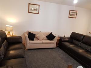 Et opholdsområde på Pleasant Point Holiday Cottages