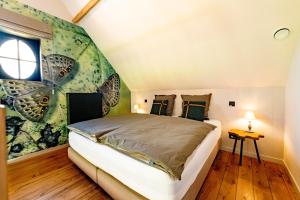 Postel nebo postele na pokoji v ubytování B&B 't Motjeshof