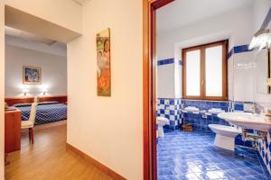 Postel nebo postele na pokoji v ubytování Hotel Gea Di Vulcano