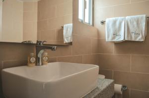 Koupelna v ubytování Hotel Latino