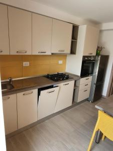 Kuchyň nebo kuchyňský kout v ubytování Apartman Mi