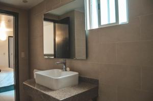 Koupelna v ubytování Hotel Latino