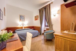 Postel nebo postele na pokoji v ubytování Hotel Gea Di Vulcano