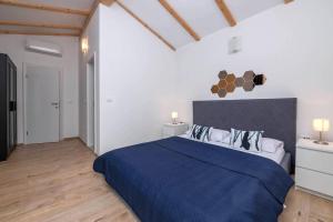 Postel nebo postele na pokoji v ubytování Villa Blaise