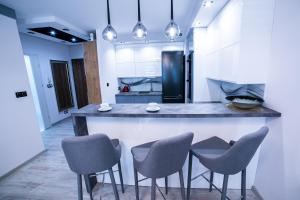 Kuchyňa alebo kuchynka v ubytovaní Markiz Apartments