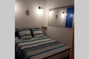 Postel nebo postele na pokoji v ubytování Séjour romantique