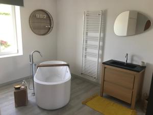 Vonios kambarys apgyvendinimo įstaigoje Etoile du Kap