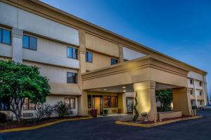a large office building with a parking lot at La Quinta by Wyndham Meridian in Meridian