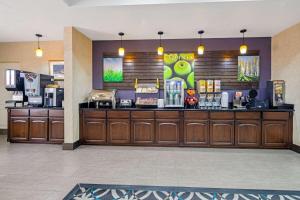 a lobby of a hotel with a coffee shop at La Quinta by Wyndham Temecula in Temecula