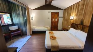 Ένα ή περισσότερα κρεβάτια σε δωμάτιο στο Bilit Adventure Lodge