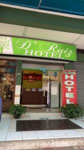 sklep przed sklepem z hot dogami z napisem w obiekcie D’ RUIZ HOTEL w mieście Quevedo