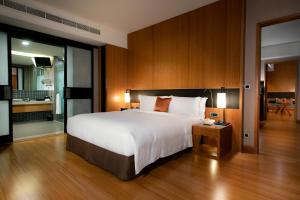 Letto o letti in una camera di Silks Place Yilan