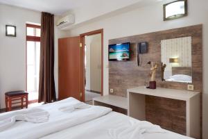 Voodi või voodid majutusasutuse Hotel Lira toas