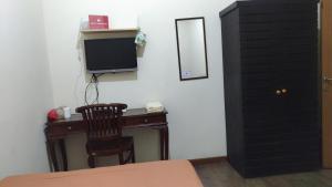 TV a/nebo společenská místnost v ubytování Casa Vanda Guesthouse