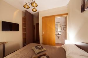 Postel nebo postele na pokoji v ubytování Dzintars Hotel