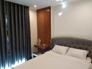 Postel nebo postele na pokoji v ubytování PEACE HOTEL