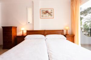 Un ou plusieurs lits dans un hébergement de l'établissement Mallorca Rooms Peguera