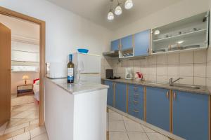 Kuchyňa alebo kuchynka v ubytovaní Lavanda Apartment