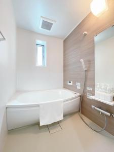 Koupelna v ubytování OUCHI HOTEL Miyajimaguchi