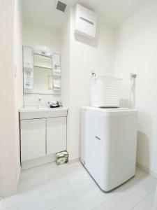 Kuchyň nebo kuchyňský kout v ubytování OUCHI HOTEL Miyajimaguchi + 37 fotografií