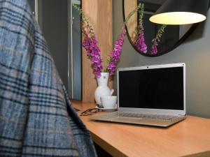 TV o dispositivi per l'intrattenimento presso Hasse på Sjökanten Hotell & Restaurang