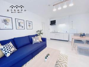 Kuchyň nebo kuchyňský kout v ubytování OUCHI HOTEL Miyajimaguchi