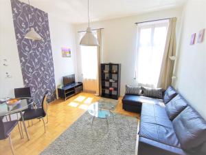 Posedenie v ubytovaní Gozsdu Apartment