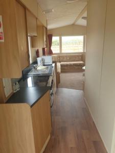 A kitchen or kitchenette at Hill View caravan