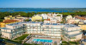 an aerial view of a building with a resort at Sabbia & Mare in Rosolina Mare