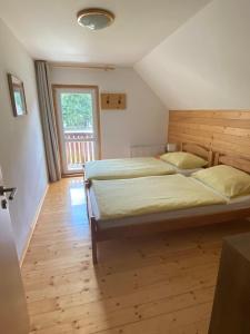 Postel nebo postele na pokoji v ubytování Sobe v Gozdu
