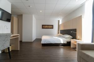 Postel nebo postele na pokoji v ubytování Los Lorentes Hotel Bern Airport