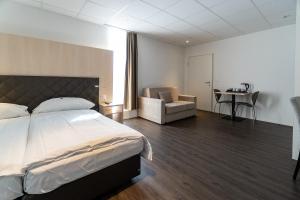 Postel nebo postele na pokoji v ubytování Los Lorentes Hotel Bern Airport